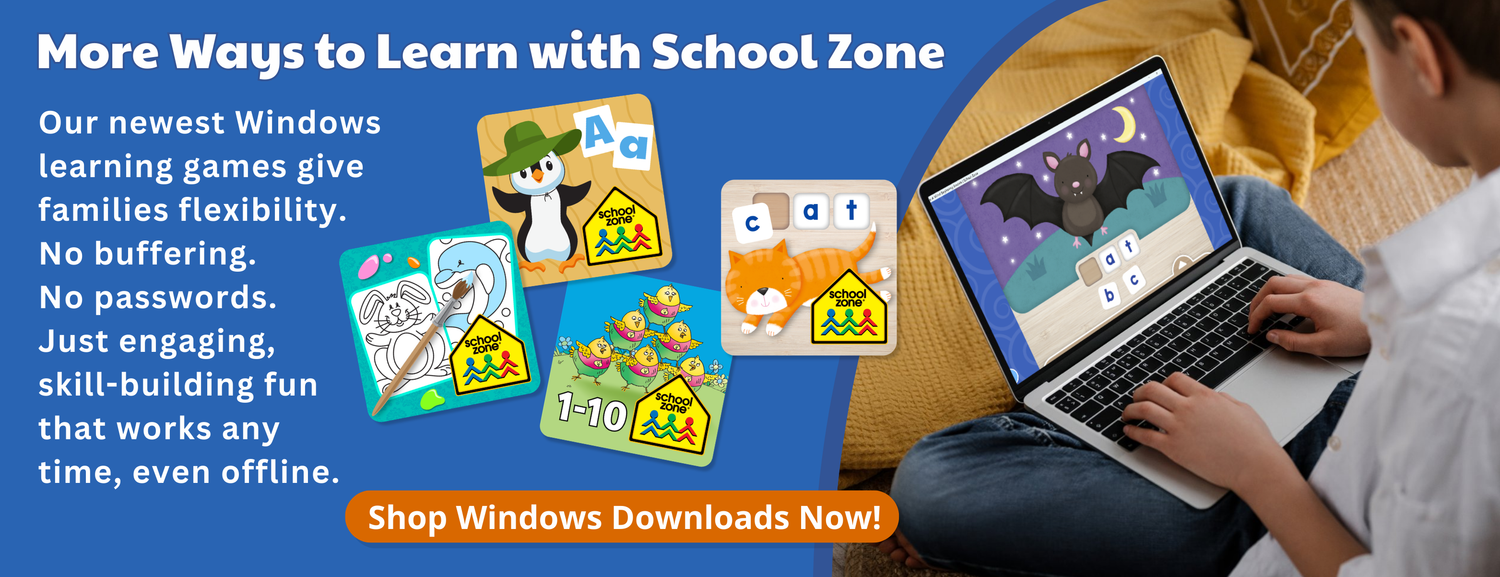 Child using a laptop with educational games displayed on the screen, promoting School Zone learning resources.