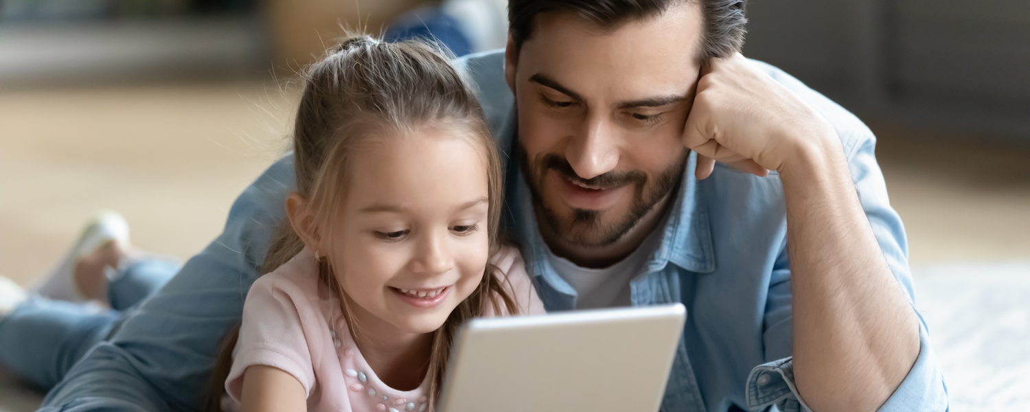 father and daughter using anywhere teacher to learn together on a tablet