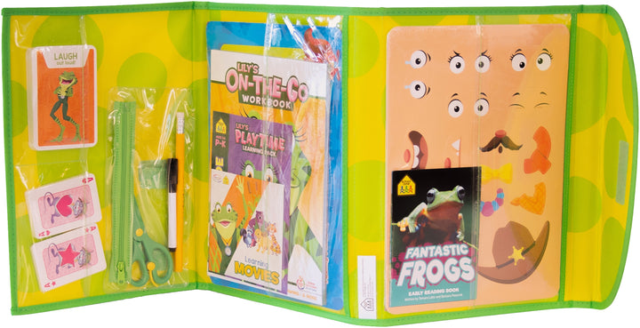 Lily's Playtime Learning Pack unfolded with books, workbooks, flashcards, scissors, game boards, and more tucked into clear plastic sleeves
